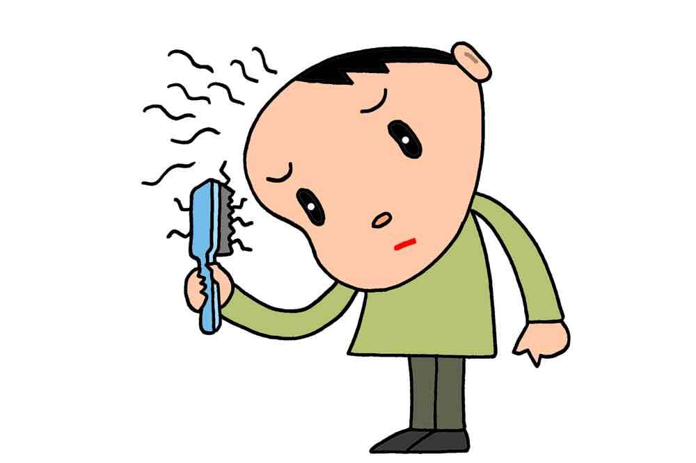 抜け毛を気にする男性