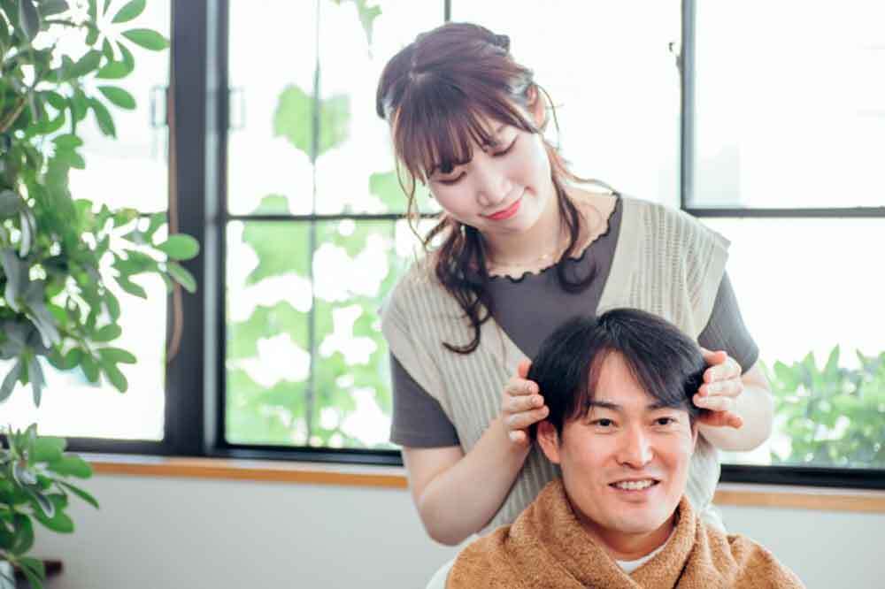 理美容師と汗をかきやすいお客様